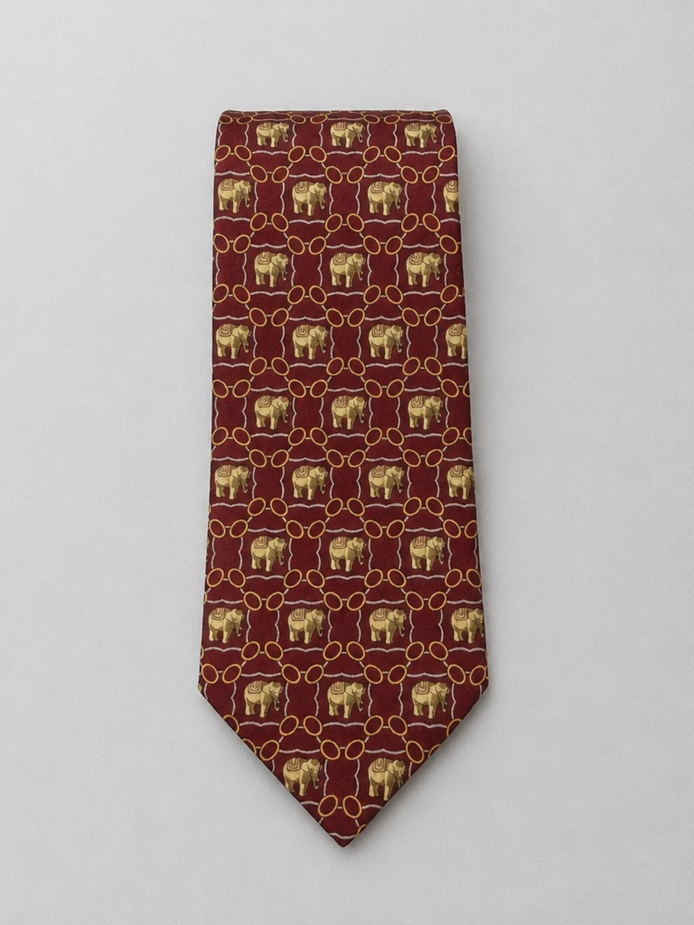 Taj Khazana (Rossiini)Men's Burgundy Tie with Gold Elephant Motif